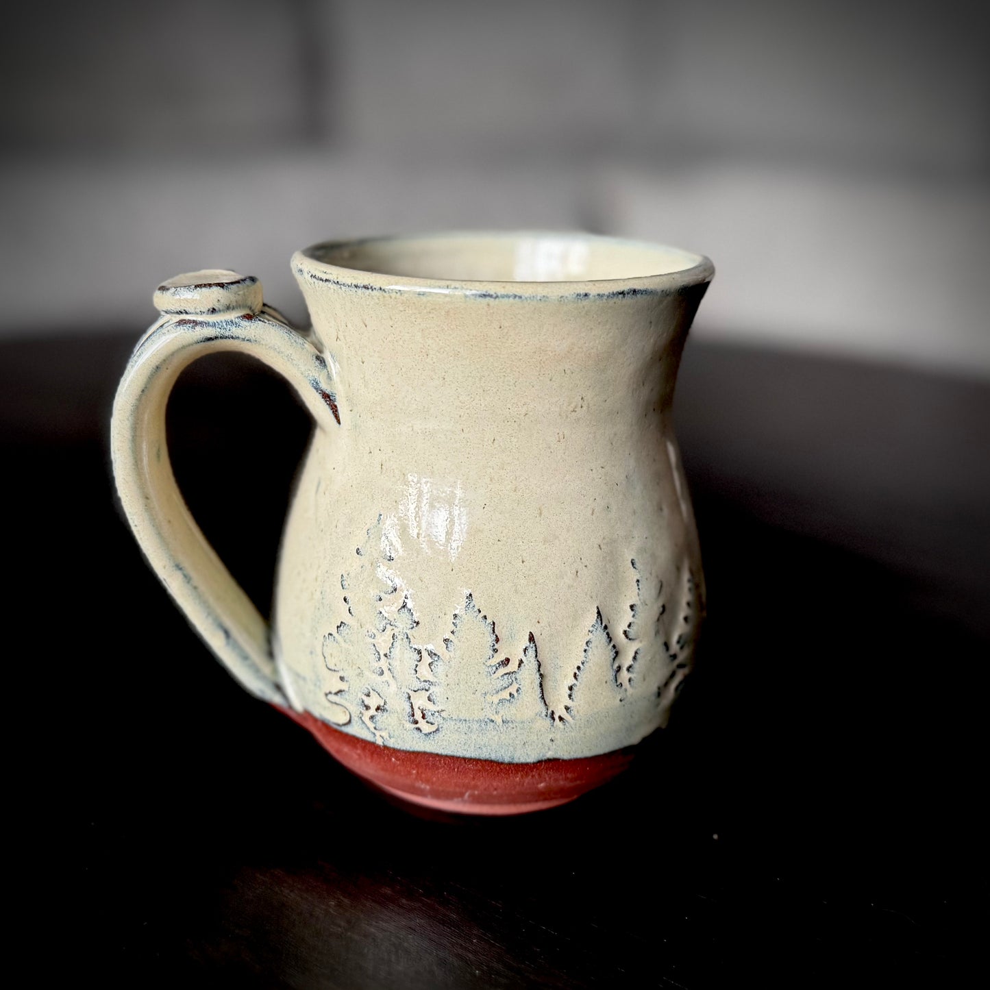 curvy mug cream treeline on dark clay